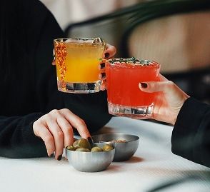 Sharing Appetizers and Enjoying Drinks (Cheers)